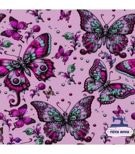 Bomuldsjersey med sommerfugle i rosa og mint på lys baggrund
