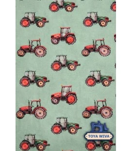 Digitalprintet bomuldsjersey med traktorer på grøn baggrund