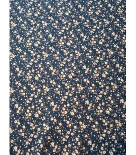 Bomuldsjersey med små blomster på mørkeblå baggrund