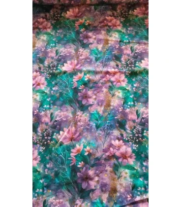 Bomuldsjersey med blomster i turkis, lilla og rosa nuancer
