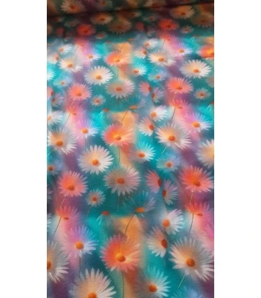 Digitalprintet bomuldsjersey med pastel margueritter på turkis baggrund